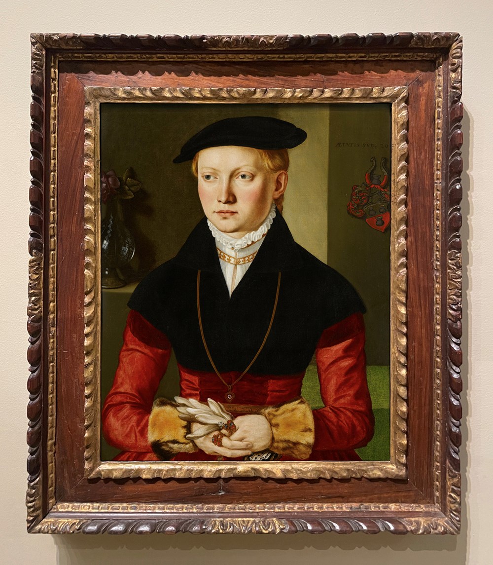 Georg Pencz (fl. c.1500/02-50), Portrait of a young woman (possibly Christina Schweitzer), 1547, o/c, 61.28 x 49.85 cm., reframed in a late 16th century north Italian parcel-gilt walnut cassetta. The historic frame is a gift of the Douglas and Mary Olson Frame Acquisition Fund
